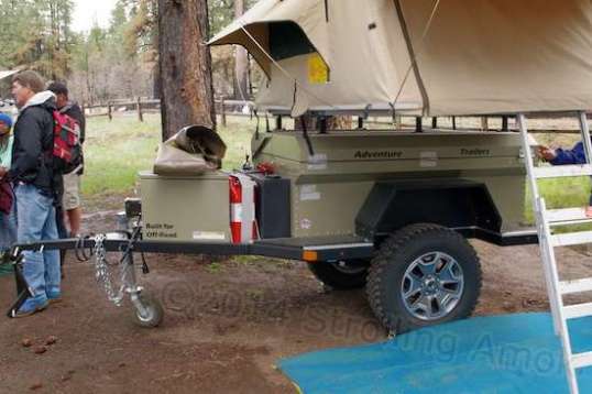 Towable with anything, put it behind a Jeep and you can get seriously off-road. I'd kill myself on that ladder, but turn a kid loose, and you'd never get him back down to the blue carpet. Ever.