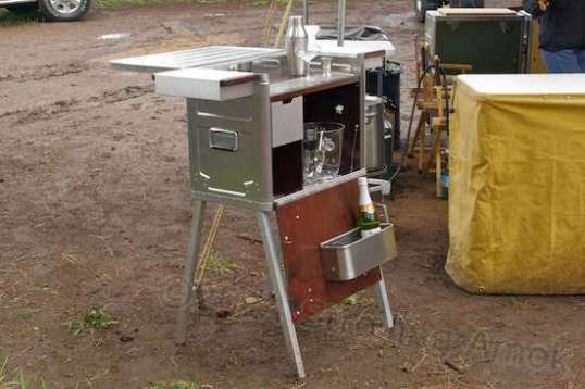 Okay. Wretched excess. A portable, self-contained stainless steel bar, for when you're really roughing it. I condemn it mainly because I wouldn't be able to lift it. But I'd come over if YOU had it.