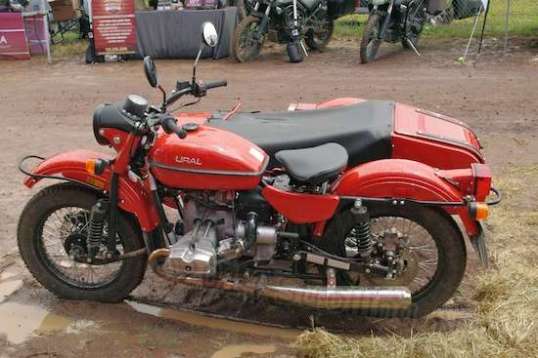 "Ural"? And using an old BMW motor? And look at the front suspension! Looks like it weighs a ton!