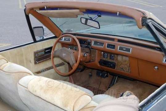 It turns out that several coach builders of the day were doing this type of surgery on Sevilles. Sure, it's misshapen, but kind of awesome in its own way.