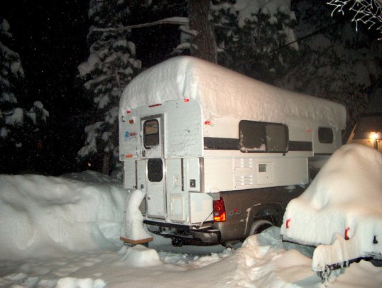 Say, isn't camping fun? This Alaskan is the bee's knees for cold weather, since it maintains full insulation all around, as well as keeps scrounging bears from getting too curious.