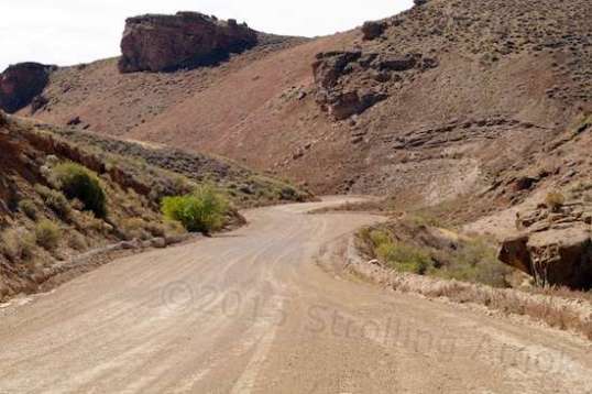 The ride downhill to pavement is two and a half miles. I alternated the front and rear brakes when I could, to give each a chance to cool a bit.
