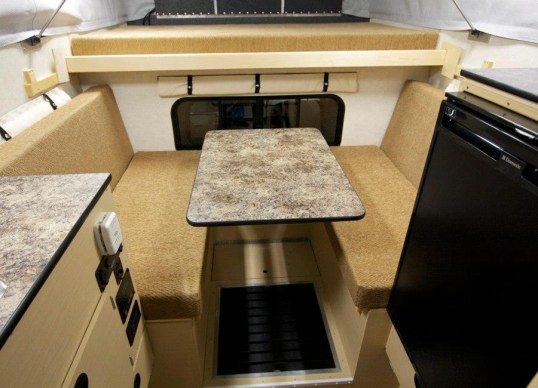 With a battery in the cabinet and a thick wire running to the bench in the right, much more battery capacity can be added, if wanted.