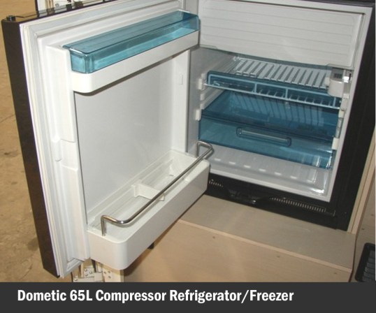 Nope, not expansive, but it will have to do. Icebox section for chilling margarita glasses is that white cover on top.