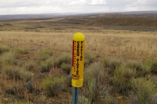 Back to business, there's an ExxonMobil CO2 pipe here. Not too sure what they use it for, except that the pipe seems to be heading for one or two areas with lights and smokestacks a long way away.