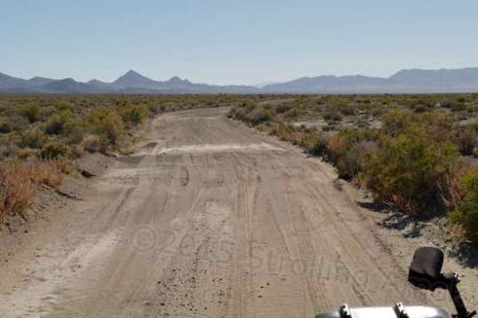 This side of the loop was much further away from the mountains and forced attention away from them. It's sole blessing: occasional spans of sand or dust, which cushioned the Mighty Furd's 70 PSI tire pressures a bit.