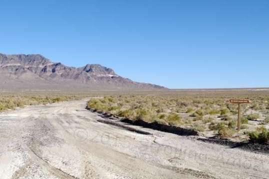 This is a marked connector that links the east and west sides, to cut the loop distance in half. Travel time is estimated at 3-4 hours, and it took me 3-1/2. A normal half-ton would do it much closer to 3, the difference being on the rougher second half.