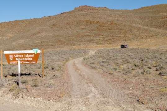 A mile further down, the tail end of the official trail along with a converted bus retaining its side-mounted stop sign. I suspect it was part of the bomb disposal unit. It's not something you advertise on the sides.