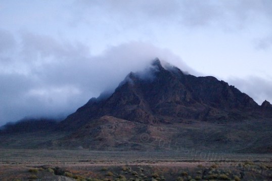 A low cloud does its thing outside my door.