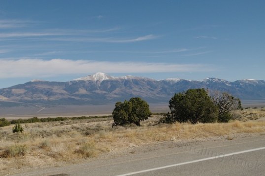 I managed to find just enough room to pull over and take this shot. In another week, the snow may begin its trek downward.