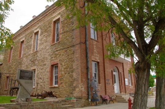 In 1871, Pioche became the county seat and this courthouse was designed in 1872 and budgeted for $26,400. Ain't much detail on what went wrong, but the original contract was broken, and what replaced it wound up costing $75,000, paid by issuing bonds. New bonds were issued to pay for the old, and by the 1880s, the county tried unsuccessfully to repudiate the bonds. Nevada law in 1907, began a series of machinations that wound up boosting the debt to $800,000, and that was not paid off until 1938, two years after the building was condemned as uninhabitable. Thus, it today is called "The Million-Dollar Courthouse".