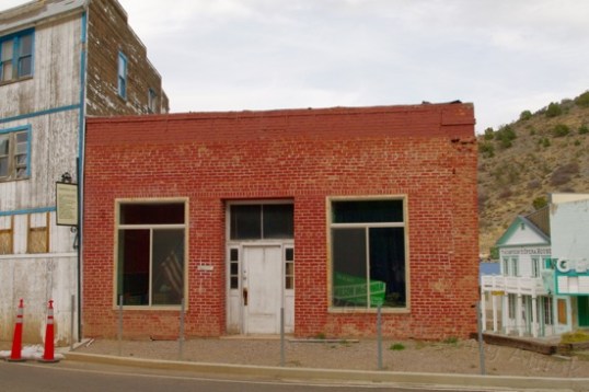 Here's that Commercial Club building, which survived an early fire and a few bullets.