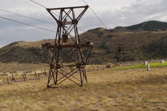 Yup, that's the Aerial Tramway, once hauling buckets of ore right through the graveyard after it had been there some 60 years. An affront in anything but a mining town, I guess.
