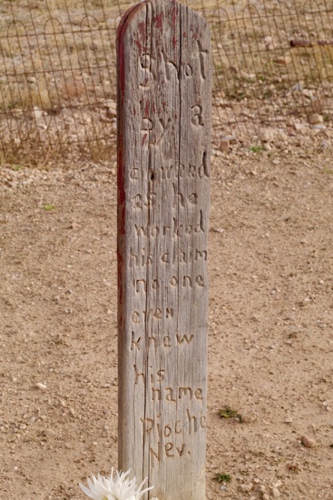 "Shot by a coward as he worked his claim, No one even knew his name. Pioche, Nev."