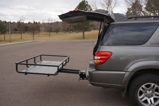 The Let's Go Aero GearCage platform slides out to allow close access to vehicle contents.