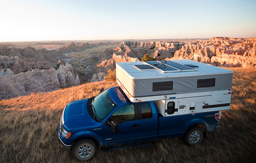 Centered vents again. This is a photographer's camper. He had the vents centered, replaced the front one with an escape hatch vent, and had panels added. The panels double as a nocturnal tripod platform for long-exposure night sky shots.