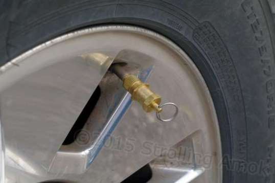 This is a Coyote automatic tire deflator, which does the same thing a puncture does, but without a repair being needed.