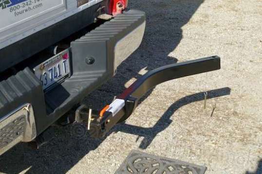 The frame slips into the hitch receiver, and you can retain it with the supplied pin, or with your own locking hitch pin.