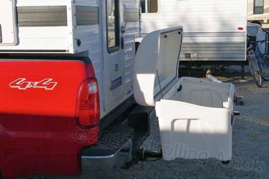 And this gives a pretty good idea of why. It's designed to allow opening the lid with the truck's tailgate on.