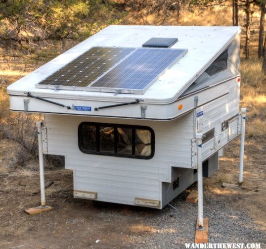 Here's 240 watts of panels mounted on an old FWC, where the rivet-laden roof clearly shows where structural beams are.