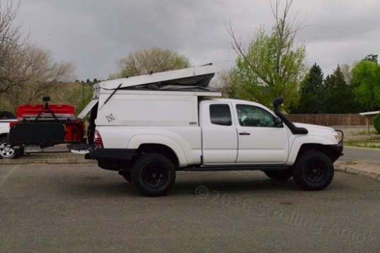 Fitted onto a Toyota Tacoma, the truck bed shell opens...