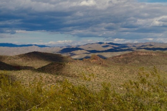 Partly cloudy days may not be the best for solar power, but the shadows look nice on the surrounding terrain.