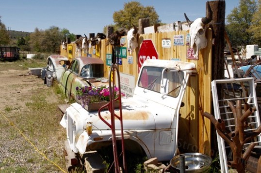 A quick stop at an "antique dealer" in Yarnell netted a closed display building and a lot of sectioned automobiles outside.