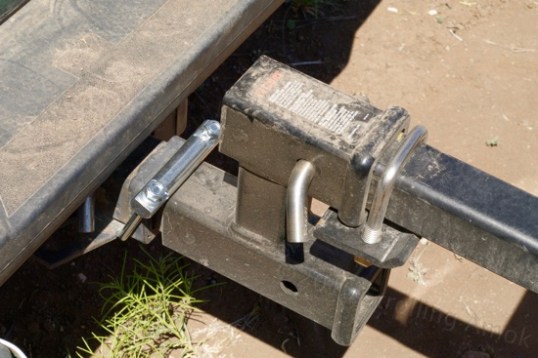 On this Curt adapter, the StowAway hitch tightener is above on the right, while the Quiet Hitch tightener is below left.