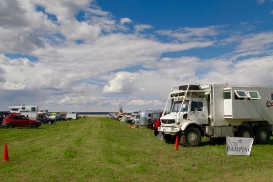 Row 3. That big rig on the right is for sale. You could probably snap it up for quarters on the dollar, if you sold your house first.