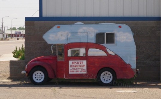Okay, it's getting crazy now. I did not look closely, but it might be a modified tiny TT grafted onto the floor pan of a Beetle sedan. The front end is real Beetle, but the rest of it is painted onto the camper's sides.