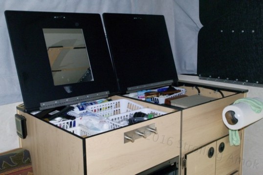 Storage, anyone? The right-hand bin is quite deep, while the left one decreases or goes away when larger fridges are fitted. These are handy as all get out, but can only be accessed when the roof is up.