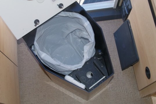 Ready for business. The pingpong ball can be seen at the bottom of its track.