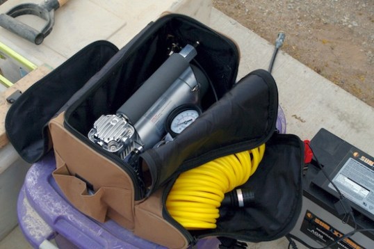 After researching 12V overlanding pumps to death, I chose a Viair pump that prioritizes reliability and value over speed. You may opt for a more powerful pump, but watch the duty cycle rating. If you have to shut it down for overheating before all four tires are back up, you'll wait much longer for it to cool so you can resume filling. I advise against cheapo auto parts store pumps for serious trail use.