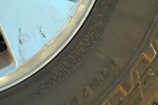 You can't read this photo, but tires have an area on the sidewall for maximum loading and maximum cold tire pressure. Light truck tires also have a service description that will refer to charts with the maximum speed that the tire can be run under maximum air pressure and load.